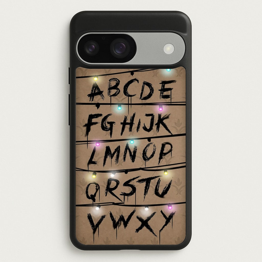 Stranger Alphabet Wall - Stranger Things Phone Case for Google Pixel 9 / 9 Pro