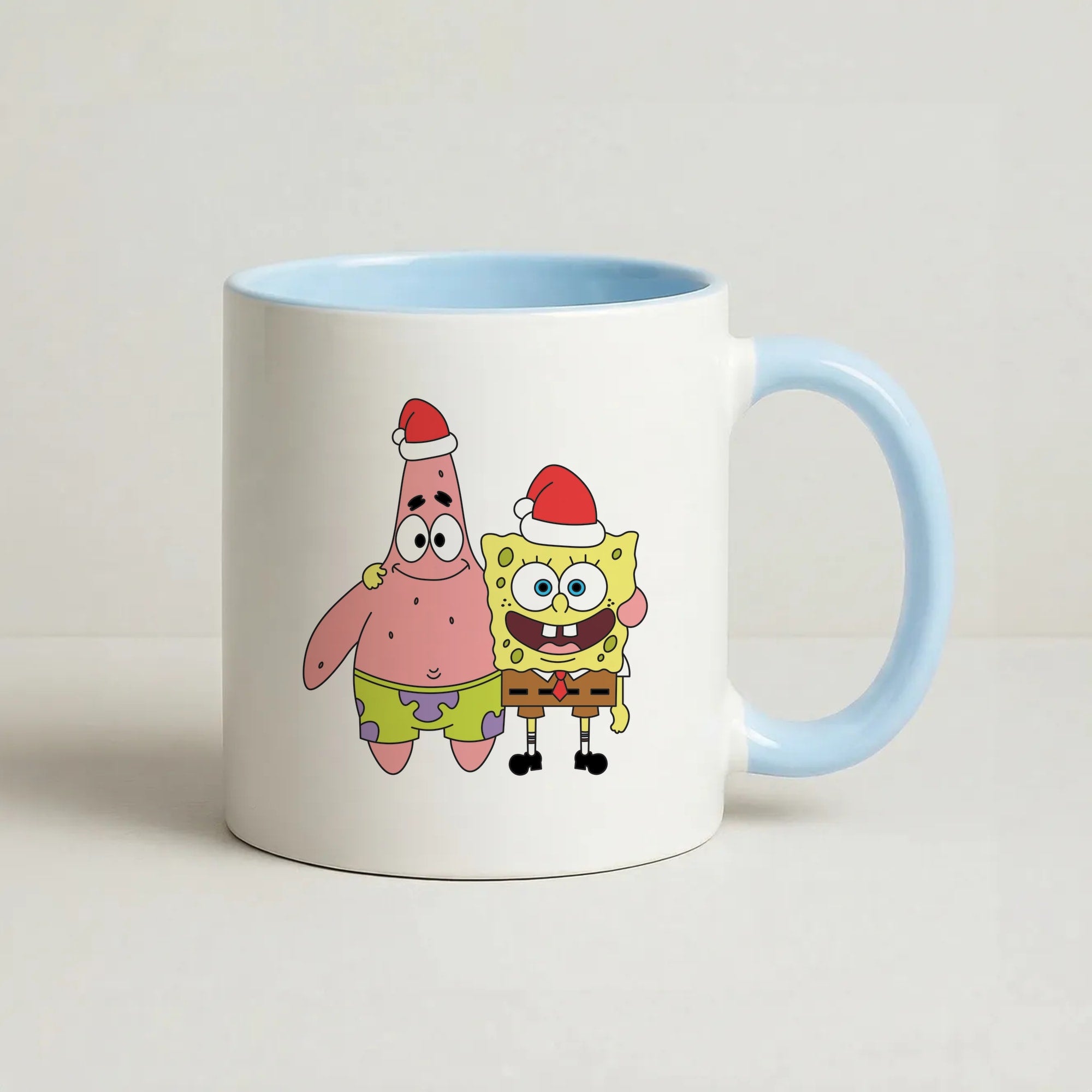 Cartoon Sponge And Starfish Christmas Hats Coffee Baby Blue Mug