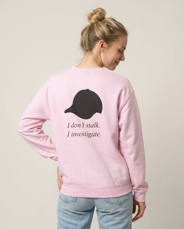 I Don't Stalk, I Investigate Sweatshirt — Pink Back, worn