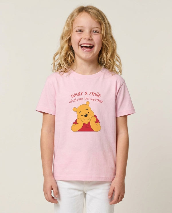 Wear A Smile Whatever The Weather Kids T-Shirt — Pink Front, worn
