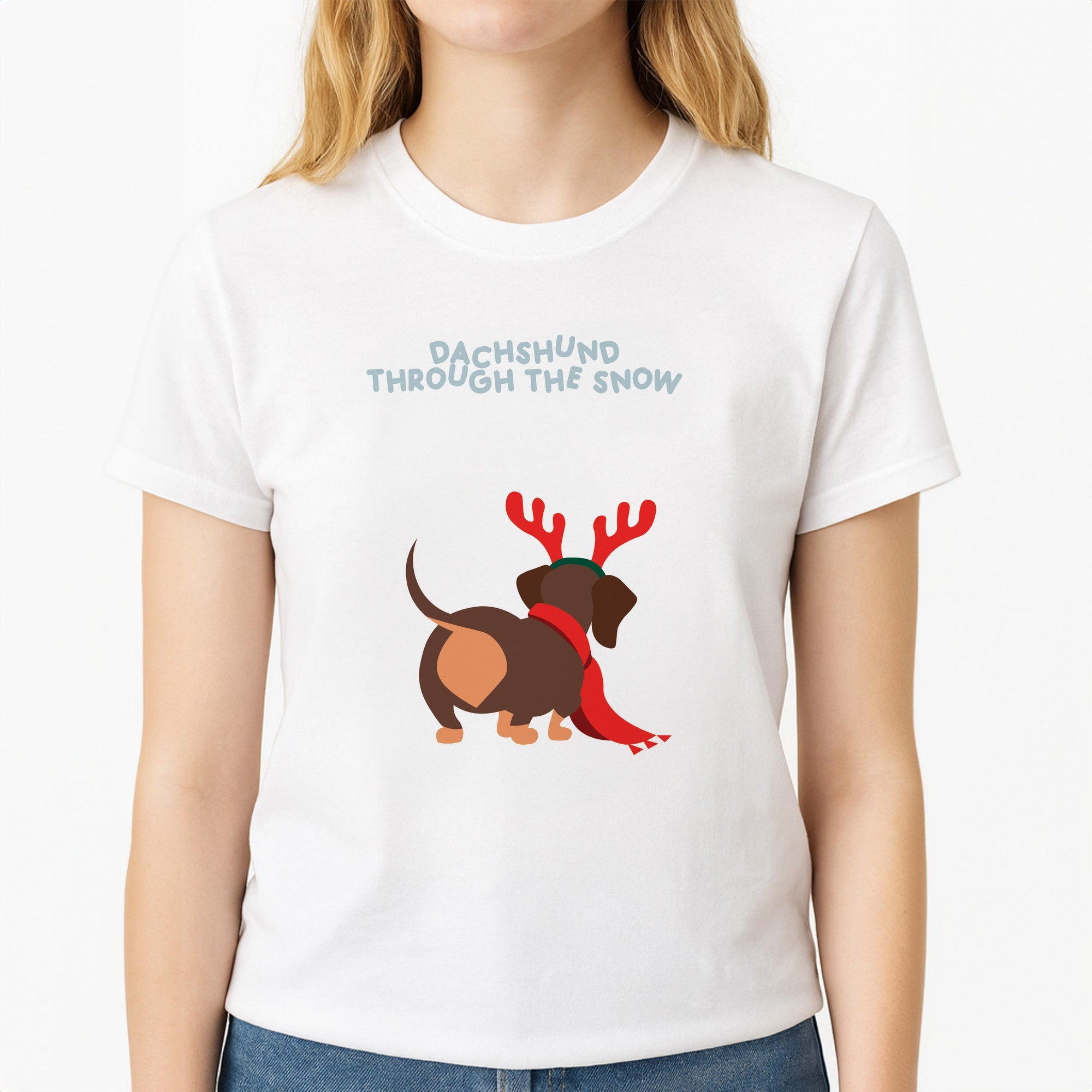 Dachshund Through The Snow - Christmas Unisex T-Shirt, worn by a female model