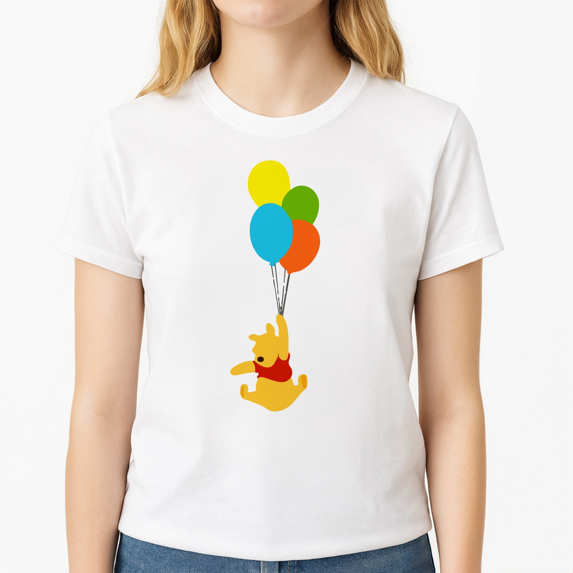 Pooh On Balloons Unisex T-Shirt, worn by a female model