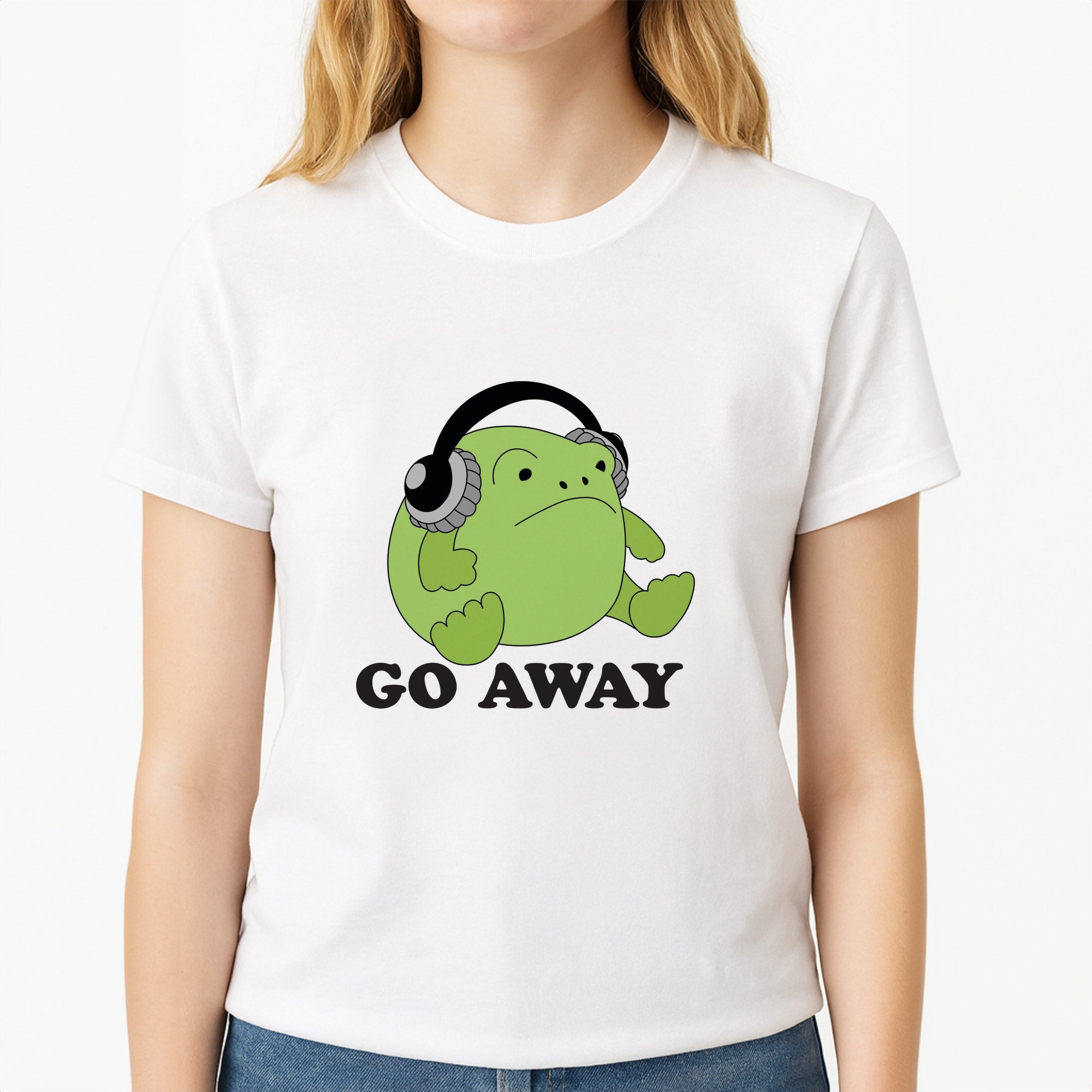 Go Away Grumpy Frog Unisex T-Shirt, worn by a female model