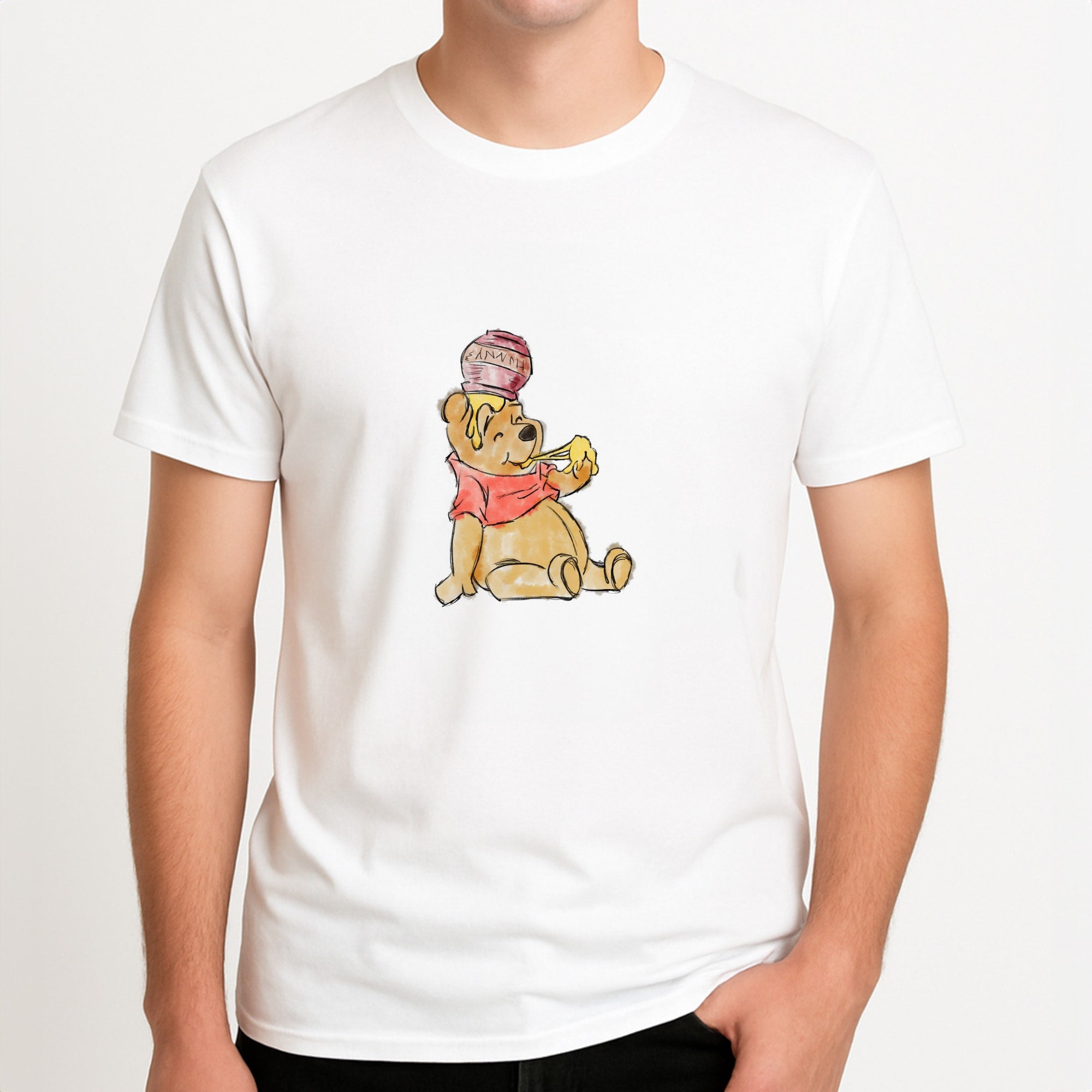 Winnie Sketch Unisex T-Shirt, worn by a male model.