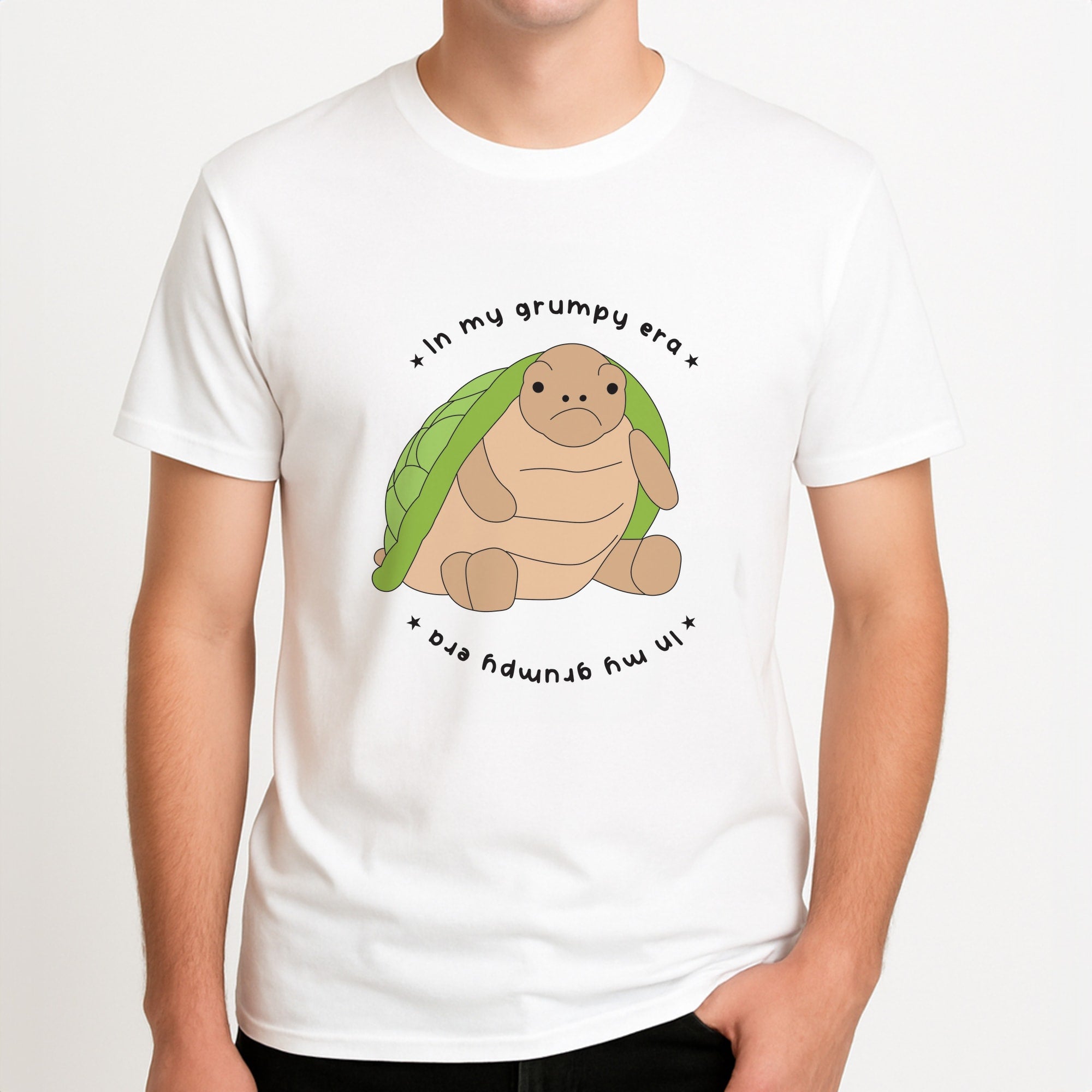 Grumpy Era Turtle Unisex T-Shirt, worn by a male model.