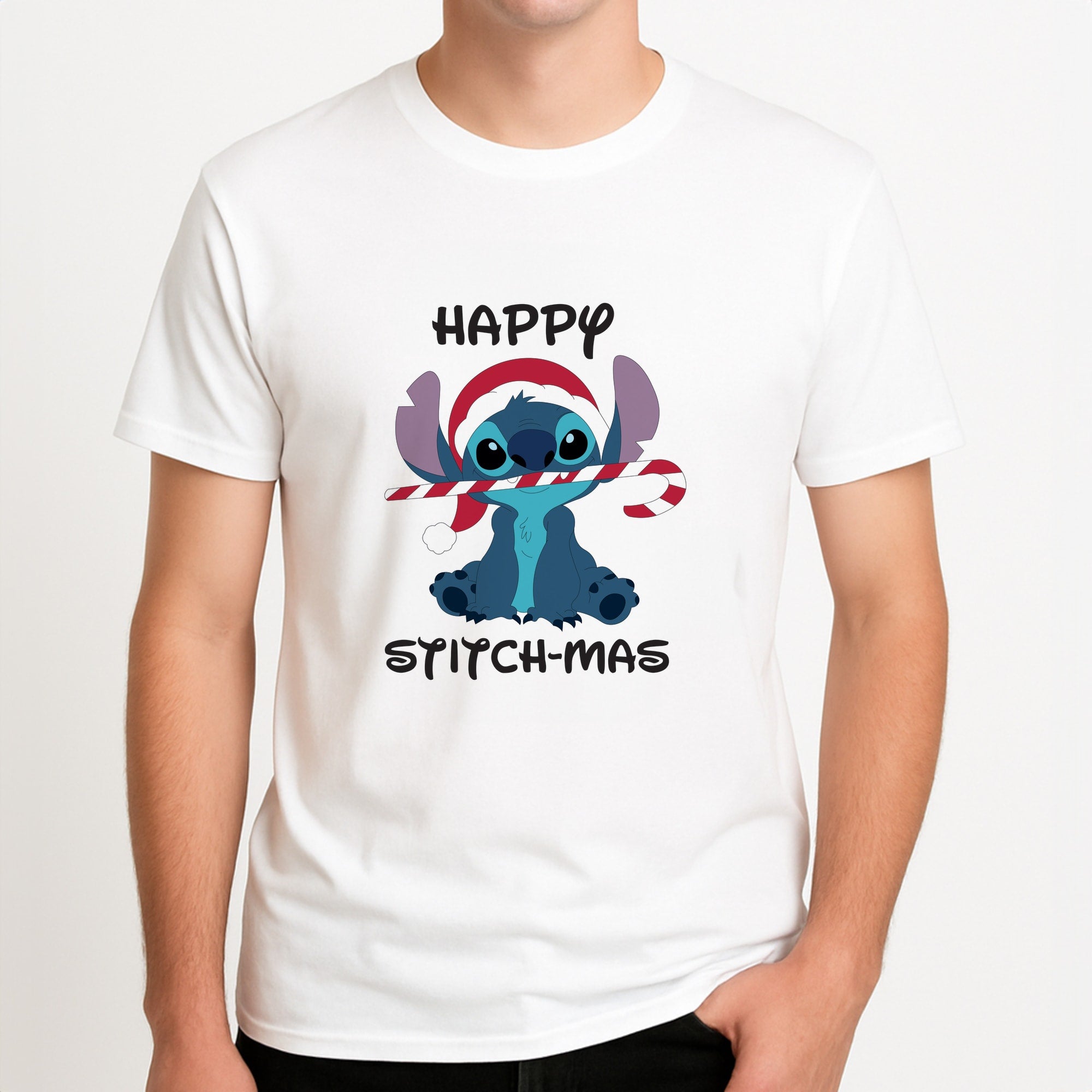 Happy Blue Alienmas - Christmas Unisex T-Shirt, worn by a male model.