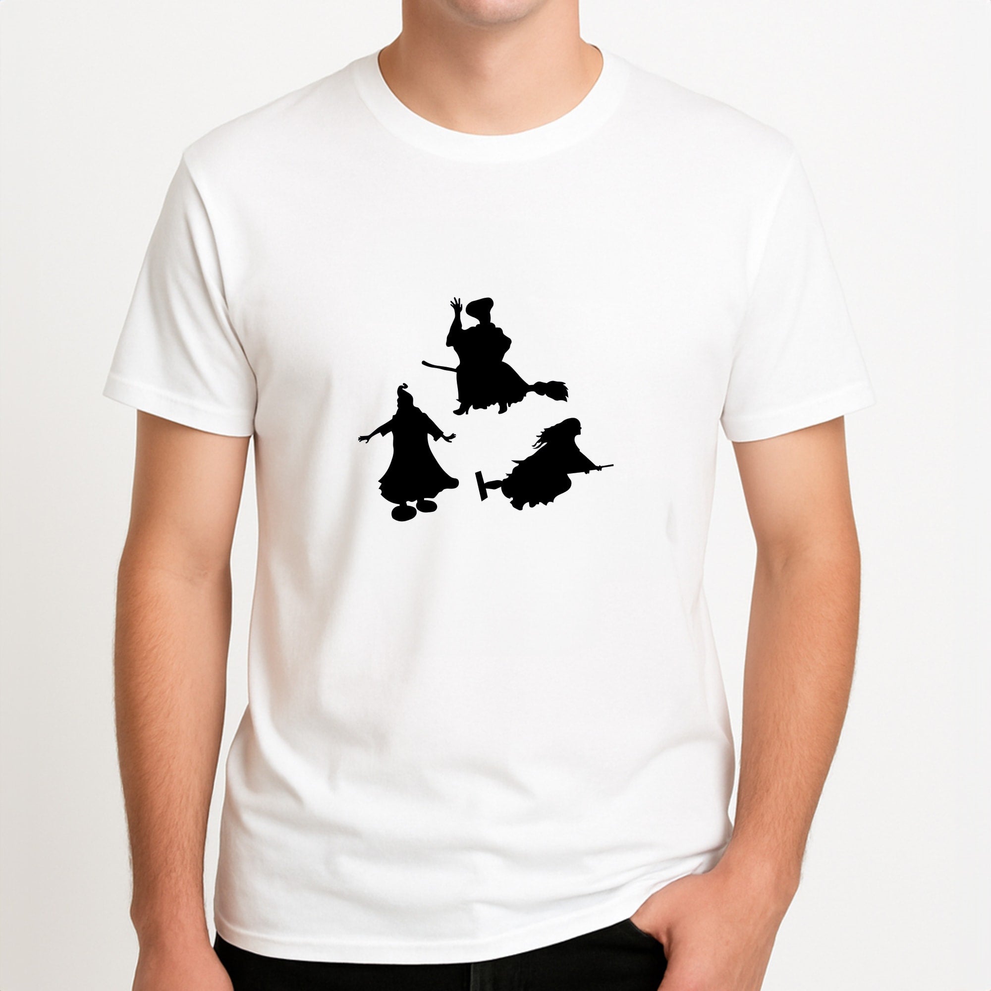 Witches Outline - Hocus Halloween Unisex T-Shirt, worn by a male model.
