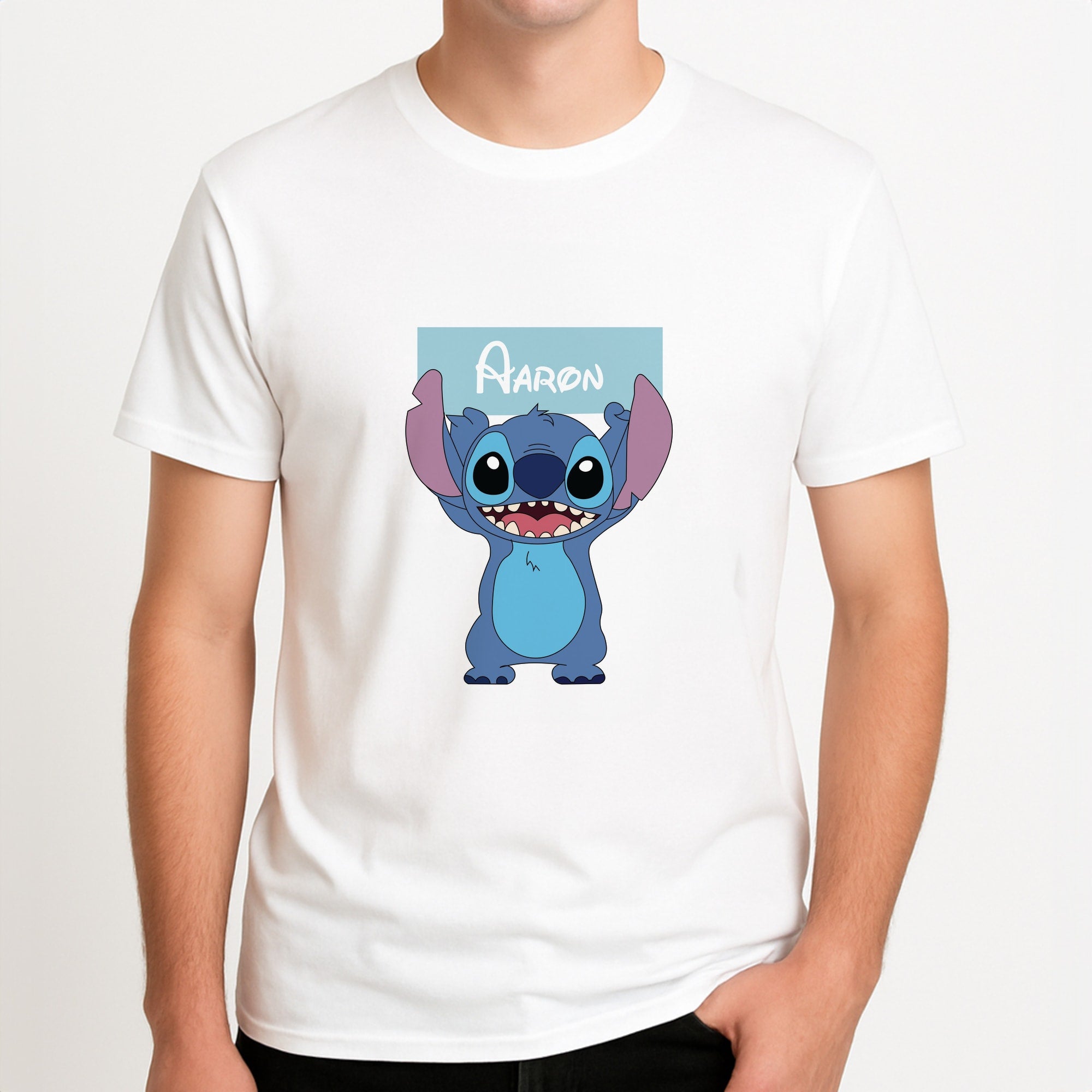 Standing Blue Alien - Personalised Disney Unisex T-Shirt, worn by a male model.