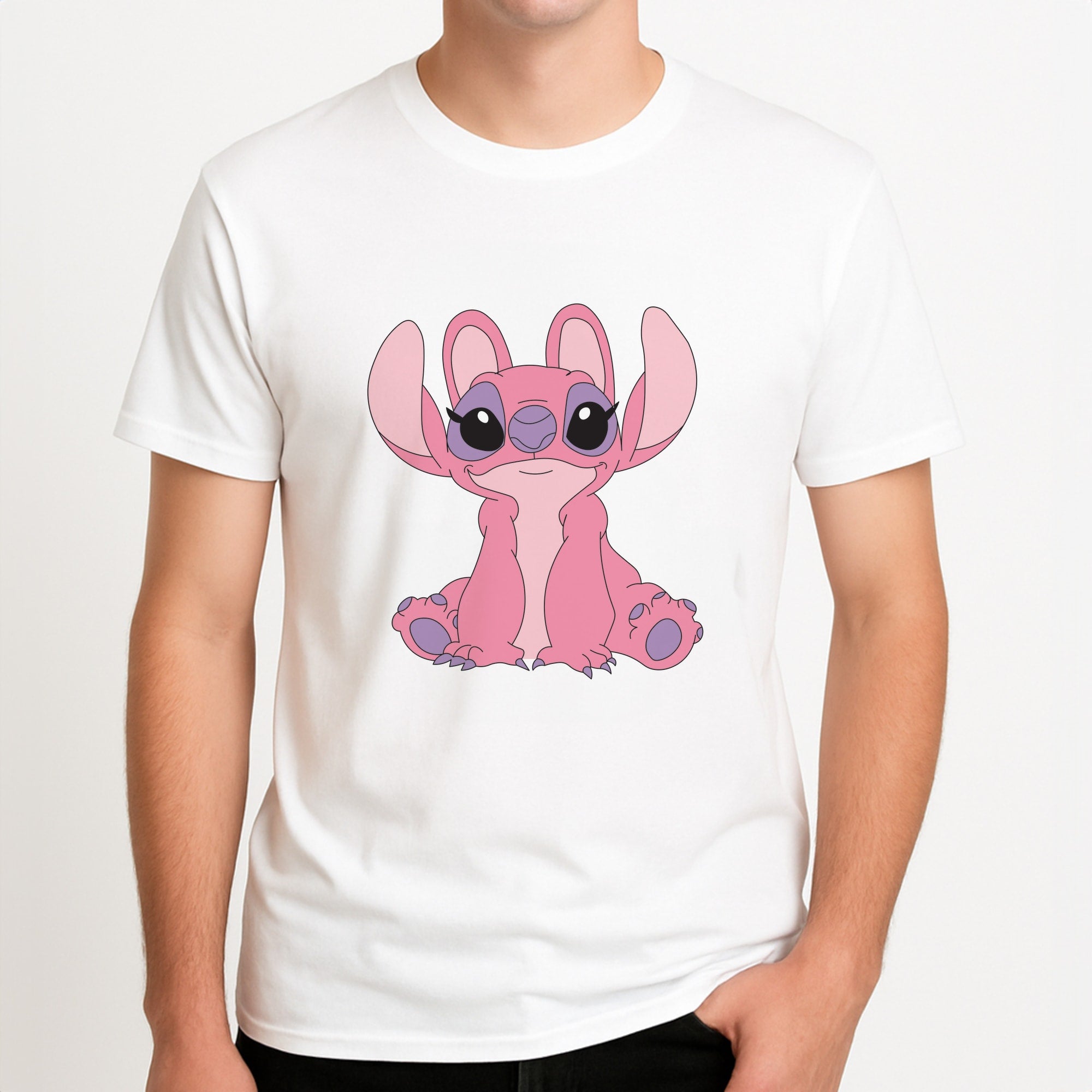 Sitting Down - Pink Alien Unisex T-Shirt, worn by a male model.