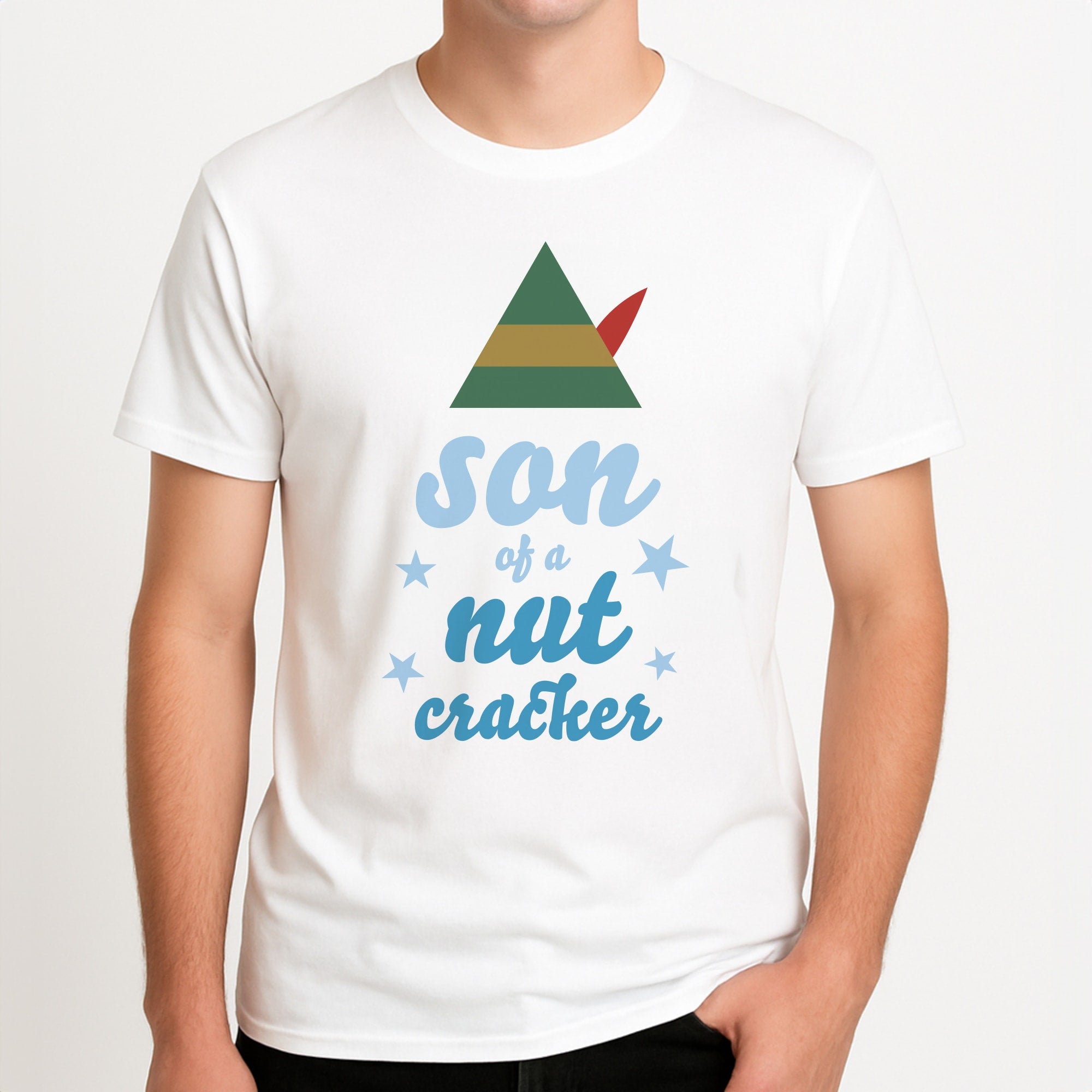 Son Of A Nut Cracker - Elf Unisex T-Shirt, worn by a male model.