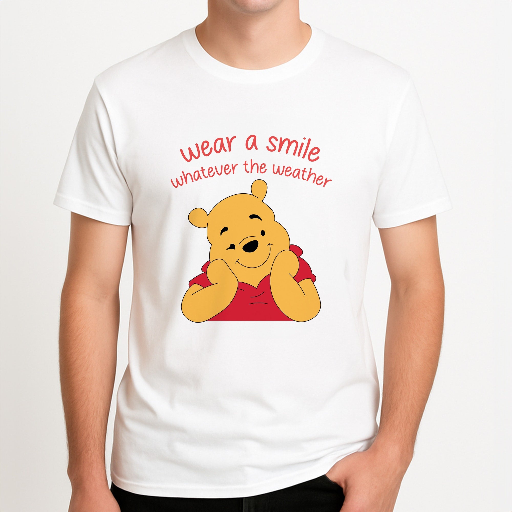 Wear A Smile Whatever The Weather Unisex T-Shirt, worn by a male model.