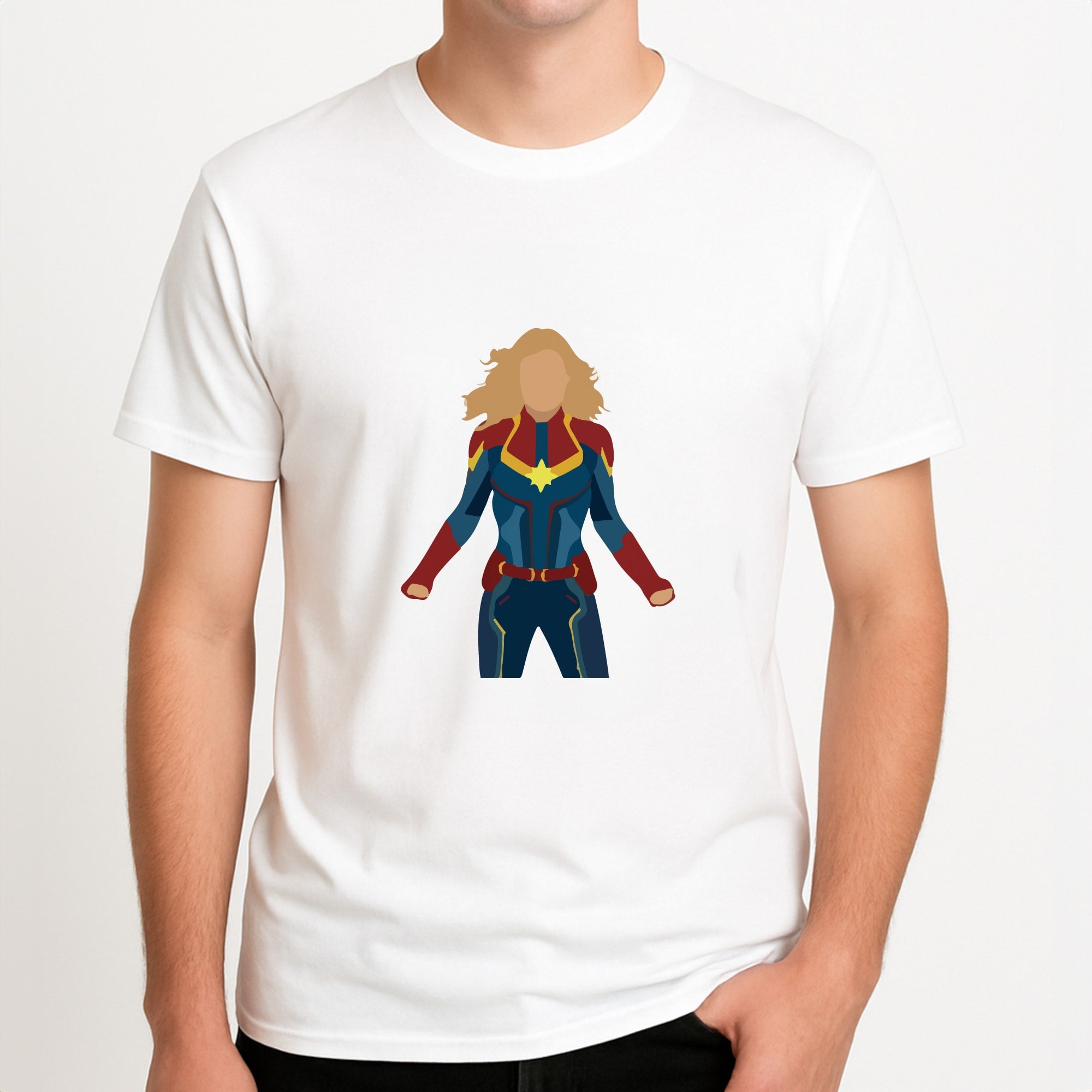 Captain Marvel Unisex T-Shirt, worn by a male model.