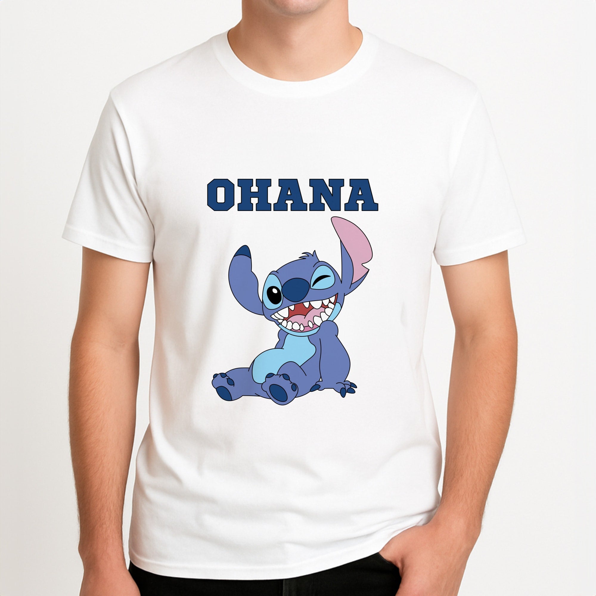 Blue Alien Ohana Unisex T-Shirt, worn by a male model.
