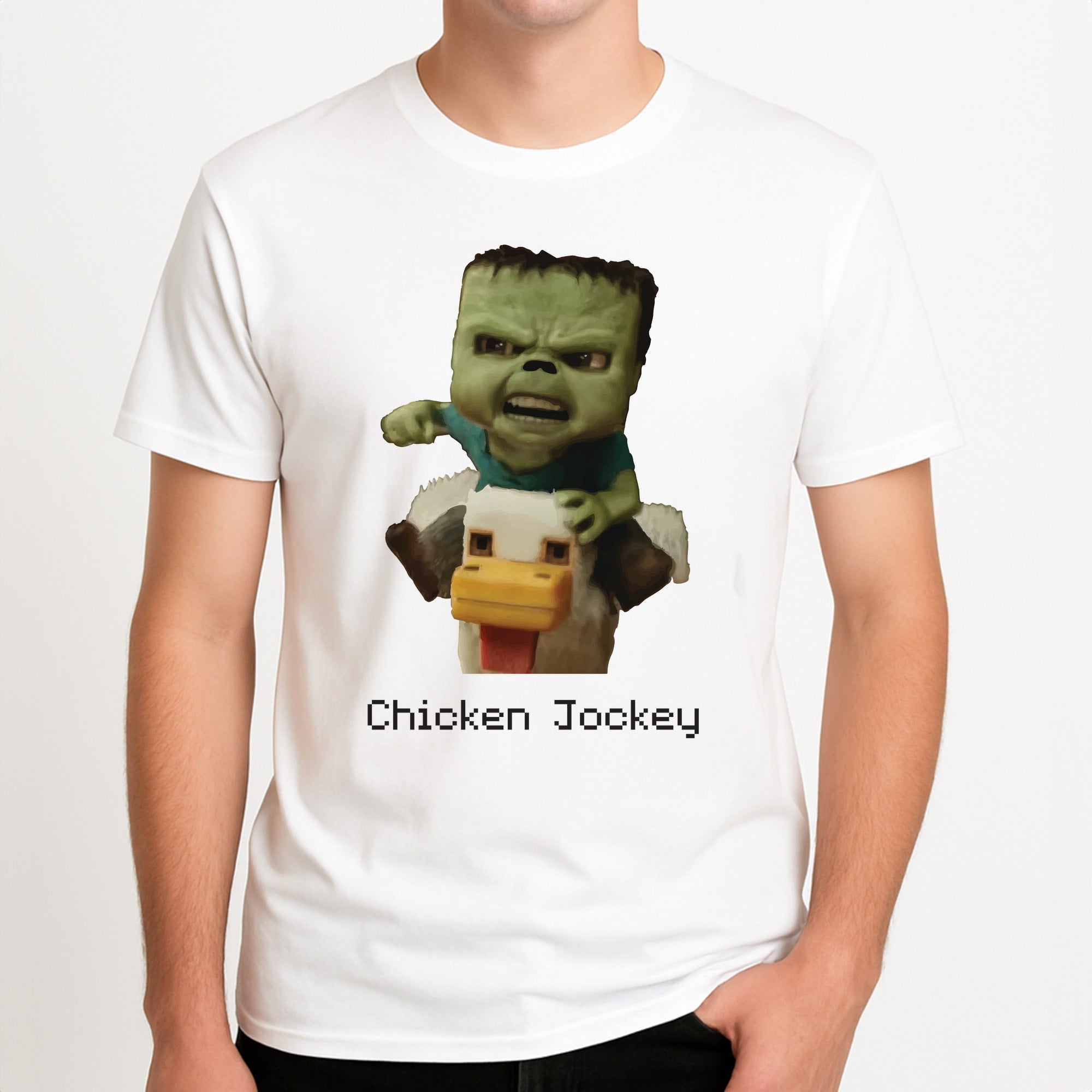 Chicken Jockey Unisex T-Shirt, worn by a male model.