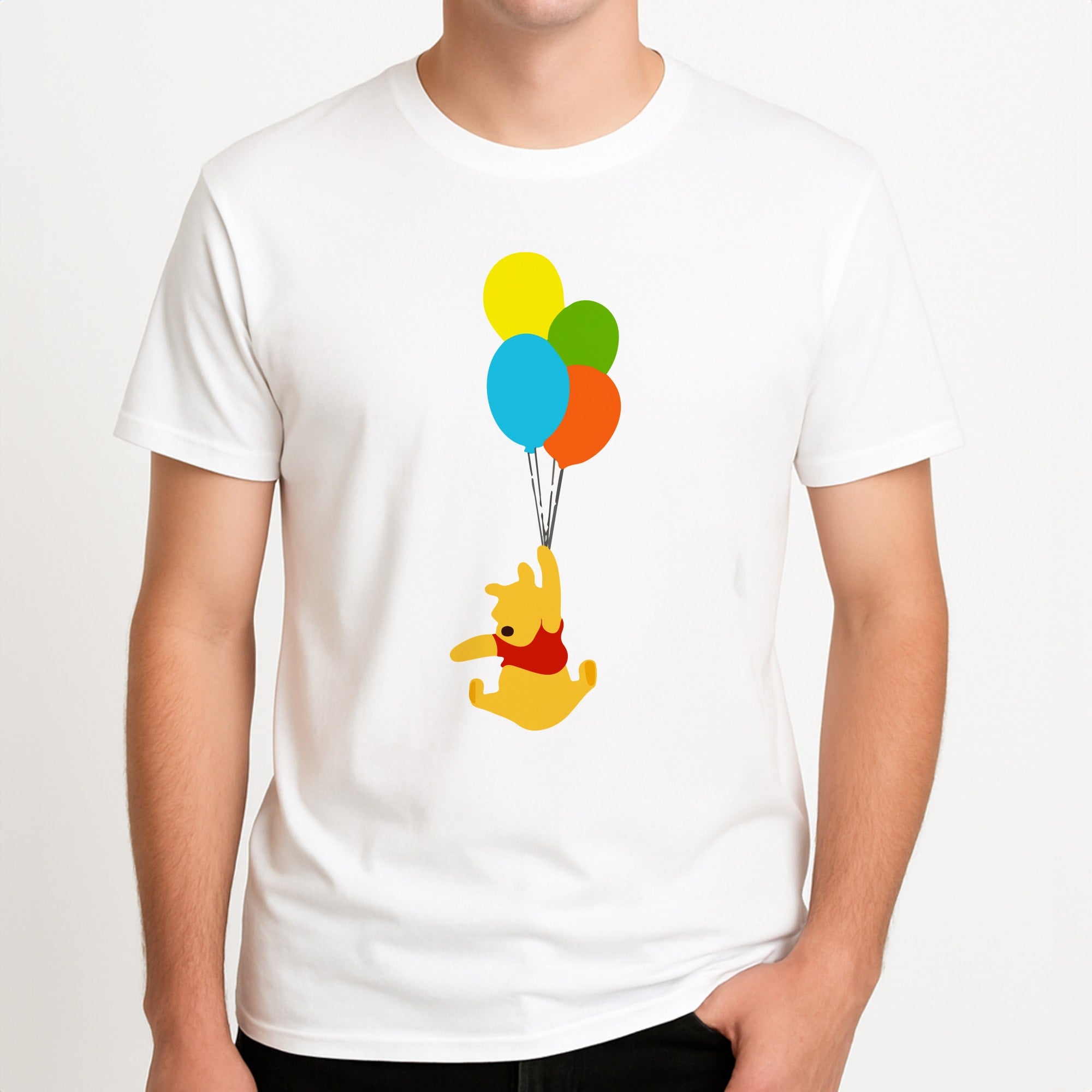 Pooh On Balloons Unisex T-Shirt, worn by a male model.