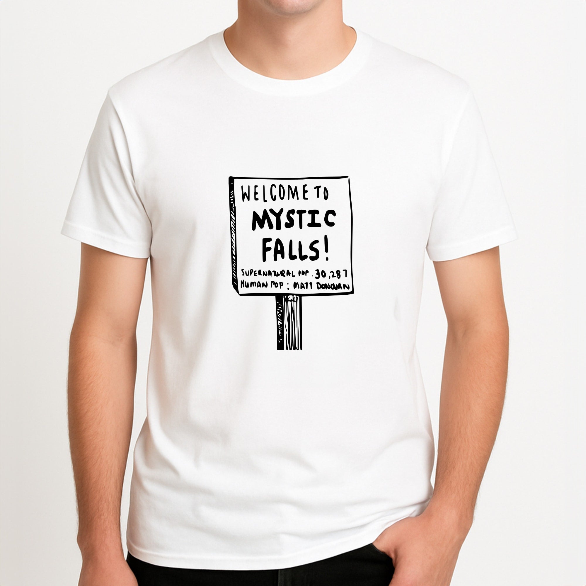 Welcome to Mystic Falls - VD Unisex T-Shirt, worn by a male model.