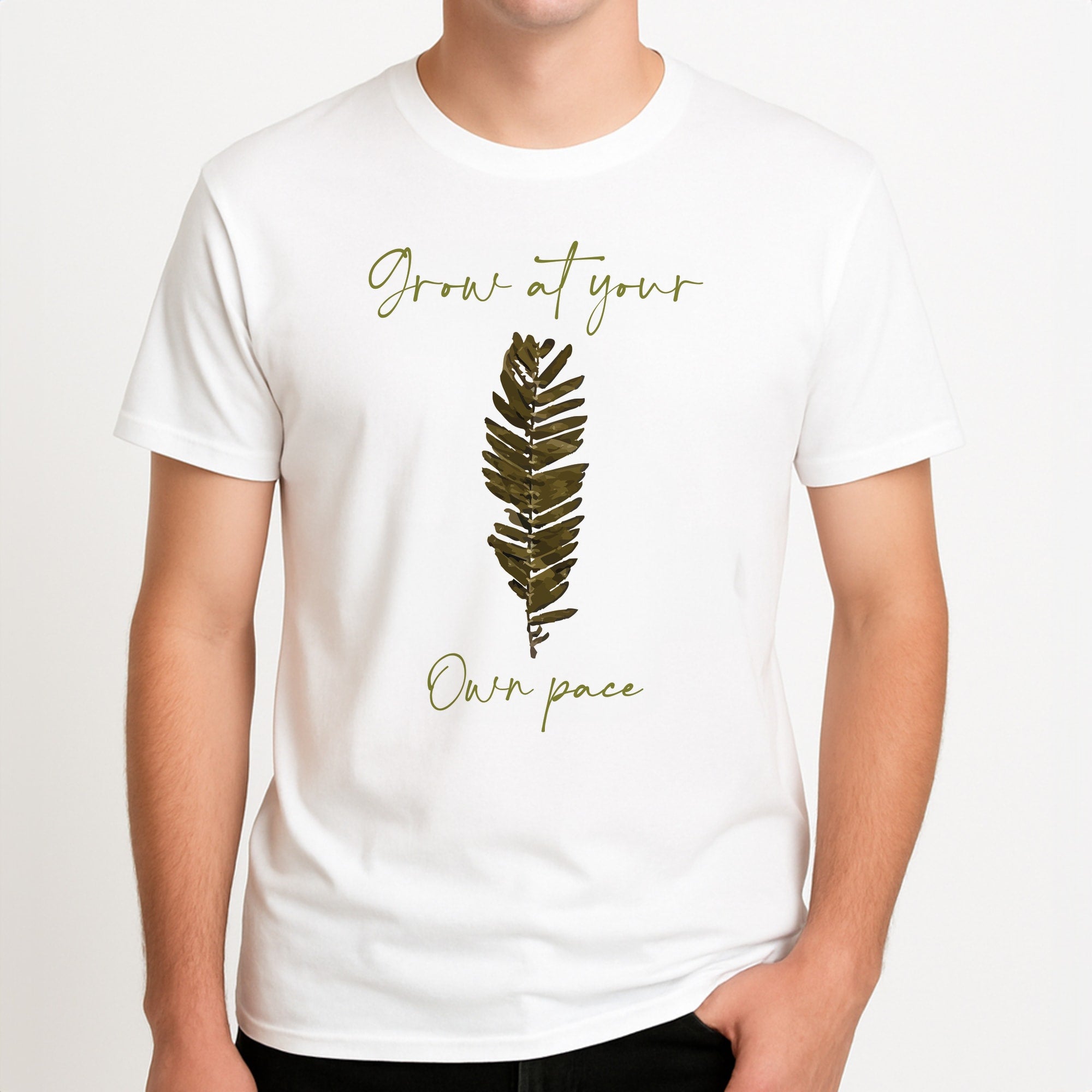Grow At Your Own Pace Fern Unisex T-Shirt, worn by a male model.