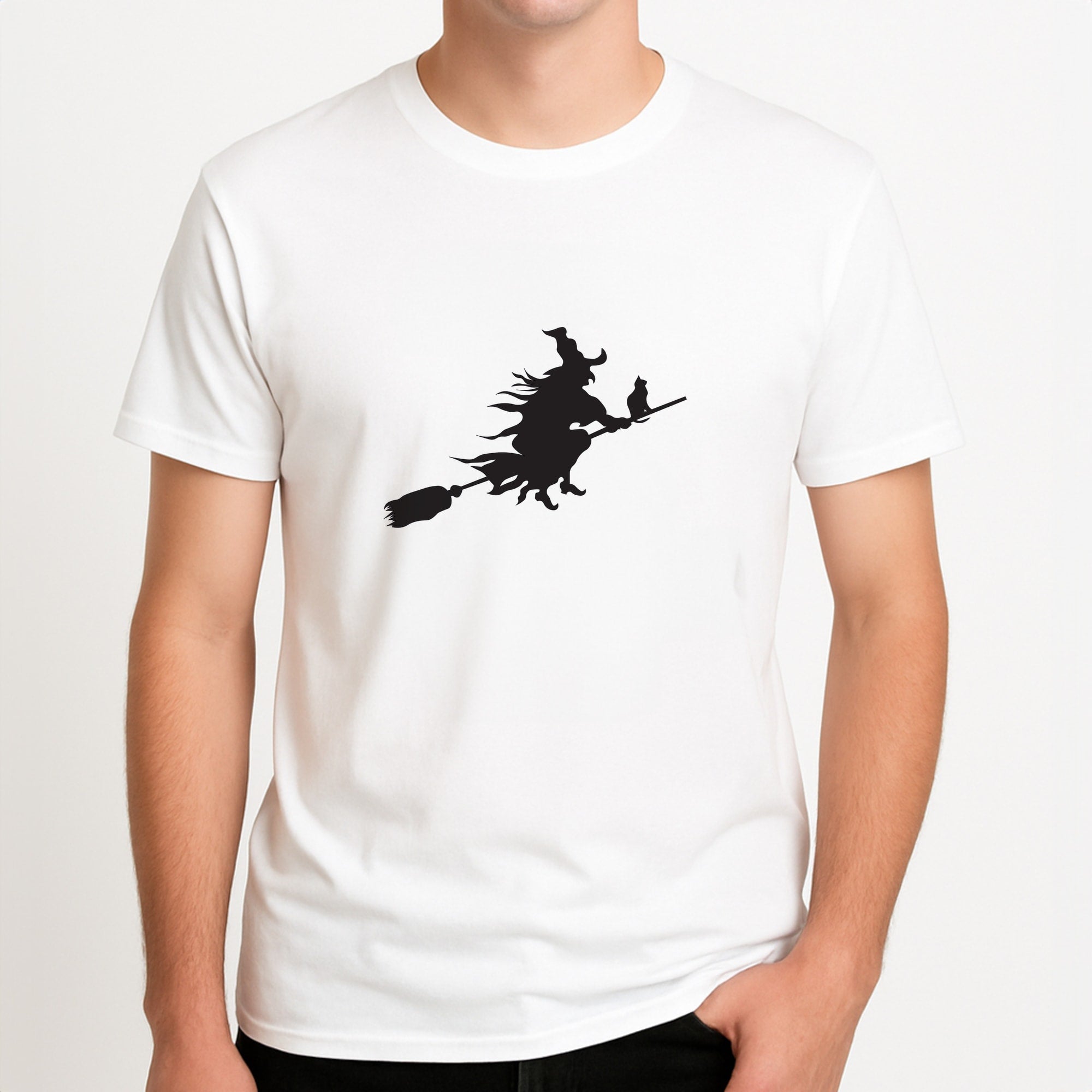 Witch And Cat - Halloween Unisex T-Shirt, worn by a male model.