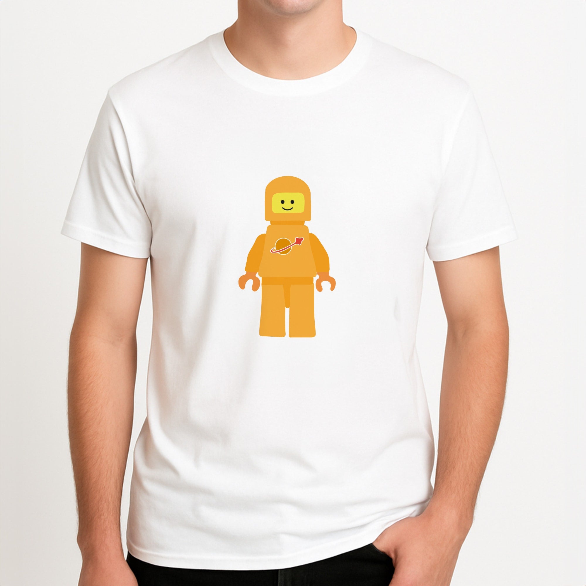Astronaut - Bricks Unisex T-Shirt, worn by a male model.