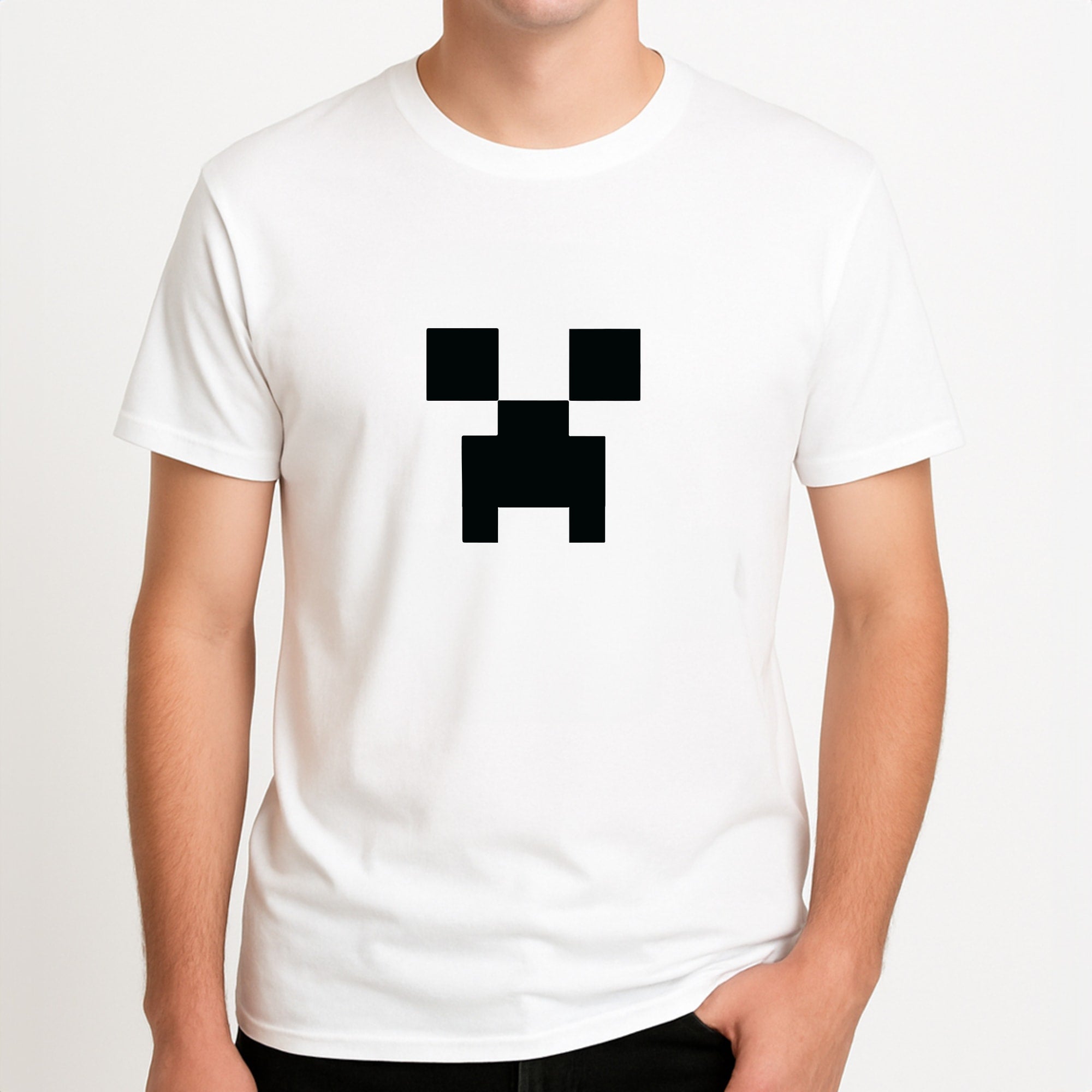 Creeper Face - Mining Unisex T-Shirt, worn by a male model.