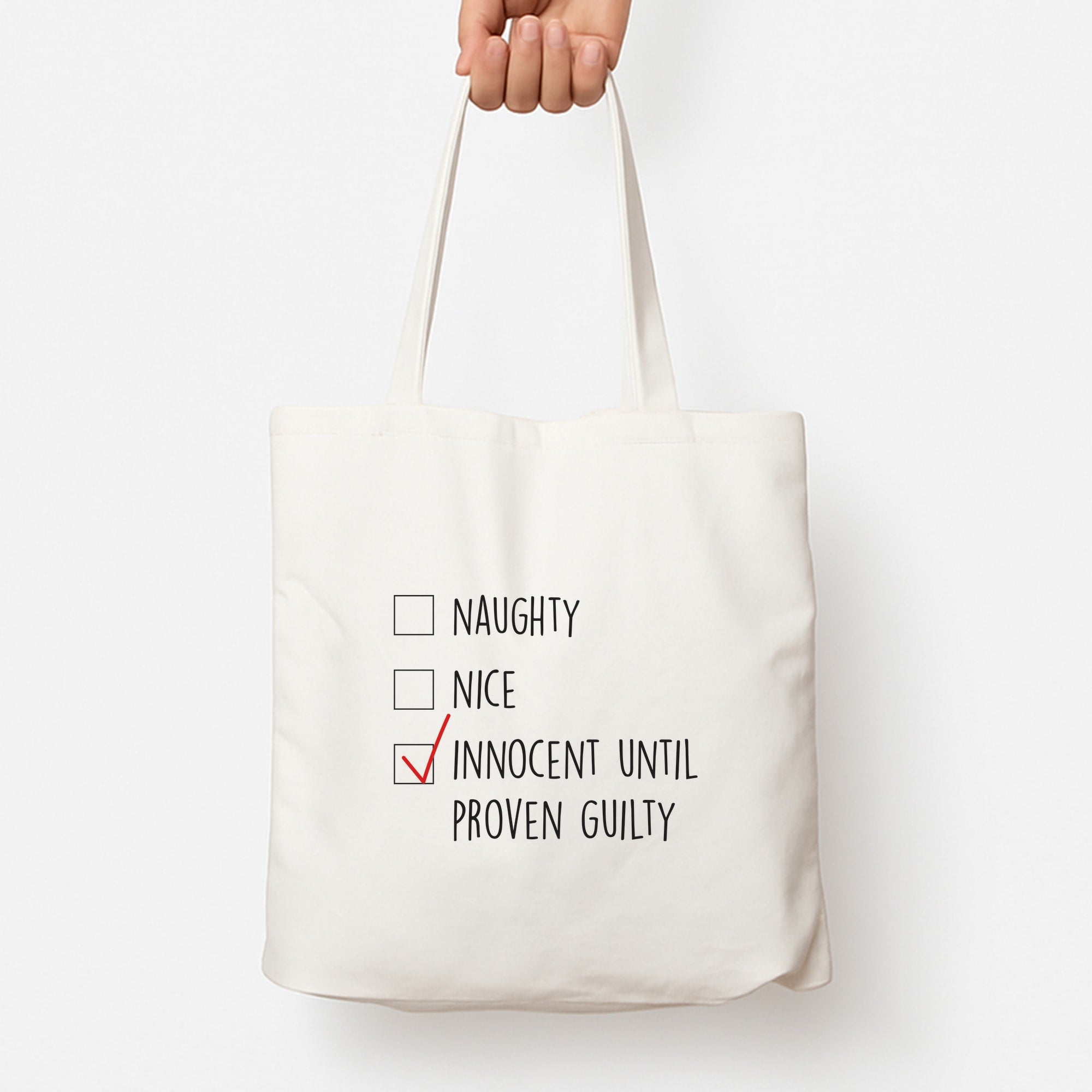 Innocent Until Proven Guilty - Naughty Or Nice  Tote Bag