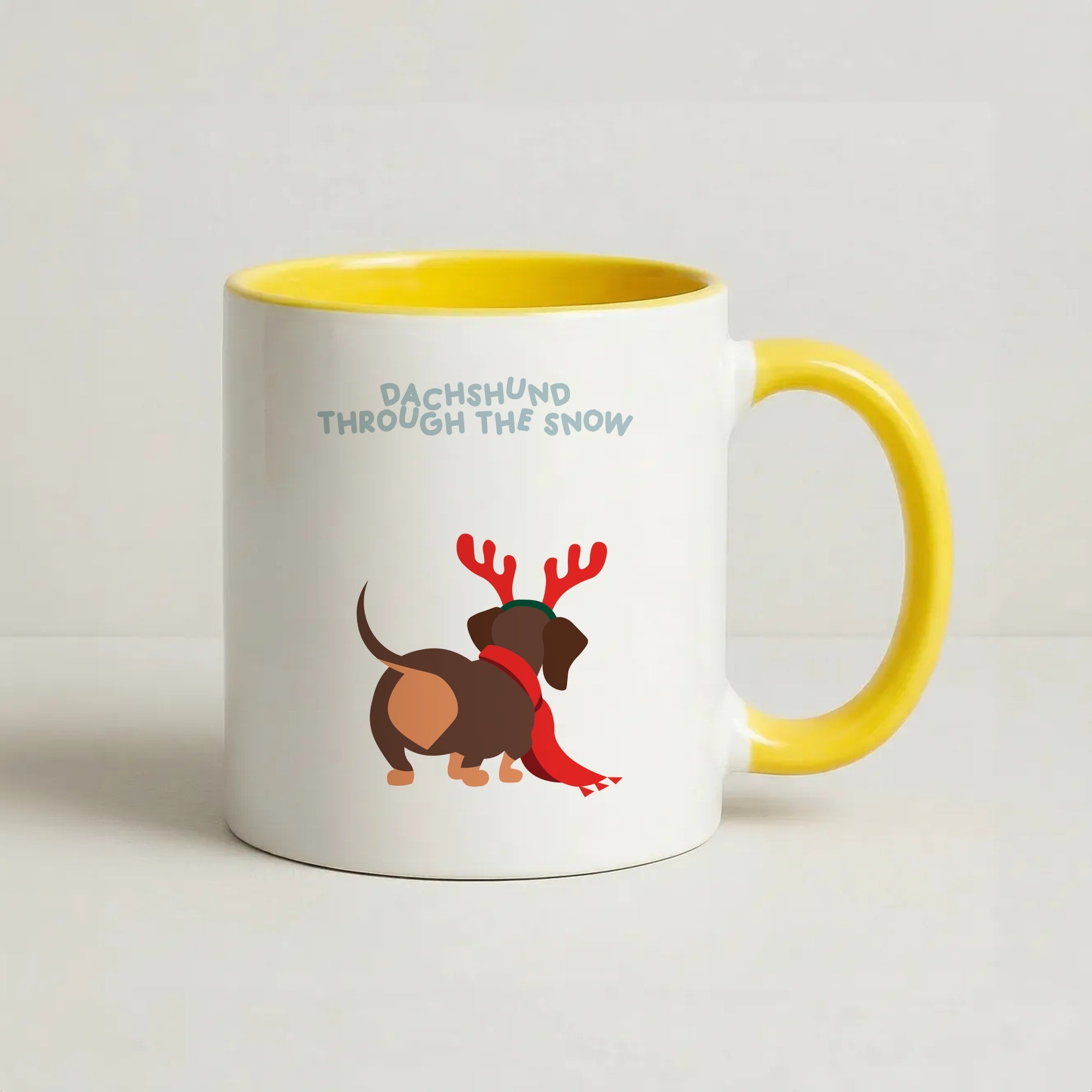 Dachshund Through The Snow - Christmas Coffee Yellow Mug