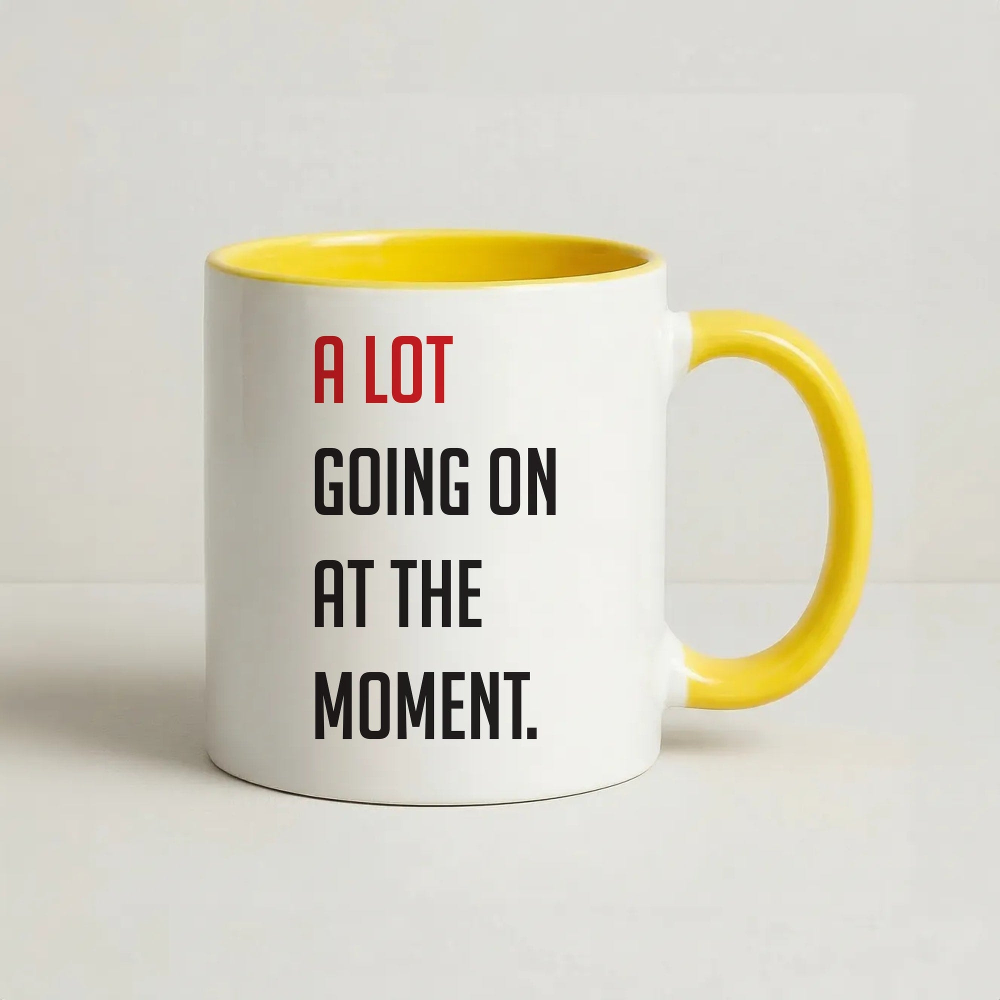 A Lot Going On At The Moment - Taylor Coffee Yellow Mug