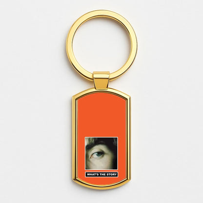 What's The Story Orange Gold Keyring