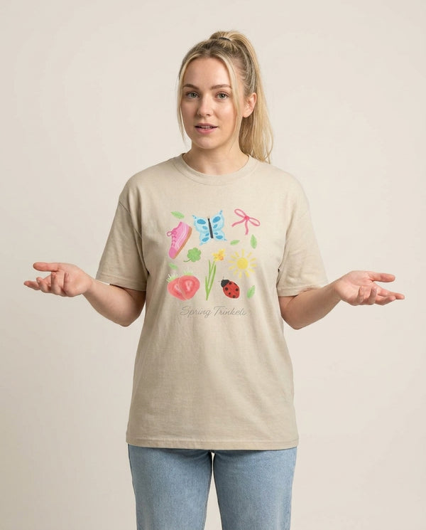Tiny Trinkets T-Shirt — Sand Front, worn