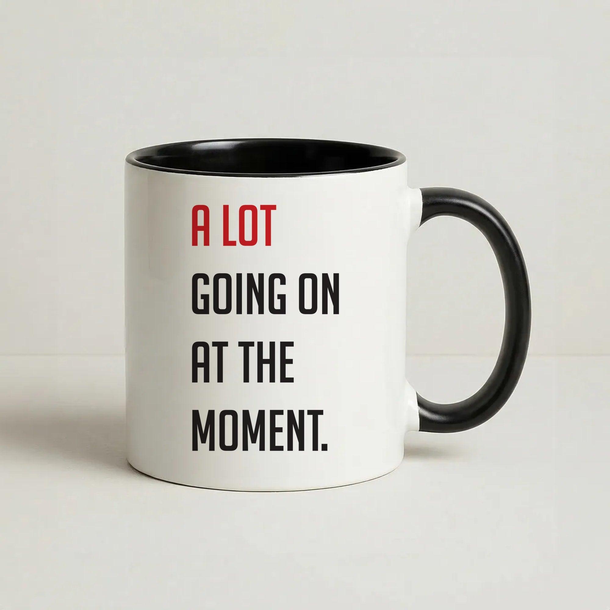A Lot Going On At The Moment - Taylor Coffee Black Mug