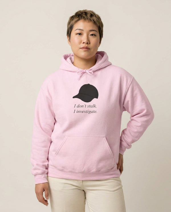 I Don't Stalk, I Investigate Hoodie — Pink Front, worn