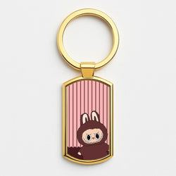 Stripey Cute Brown Monster Gold Keyring
