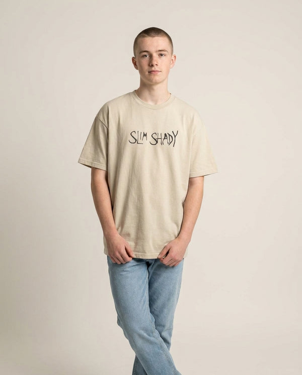Slim Shady T-Shirt — Sand Front, worn