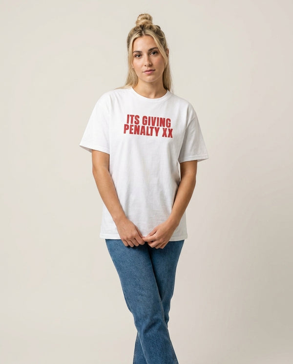 It's Giving Penalty  T-Shirt — White Front, worn