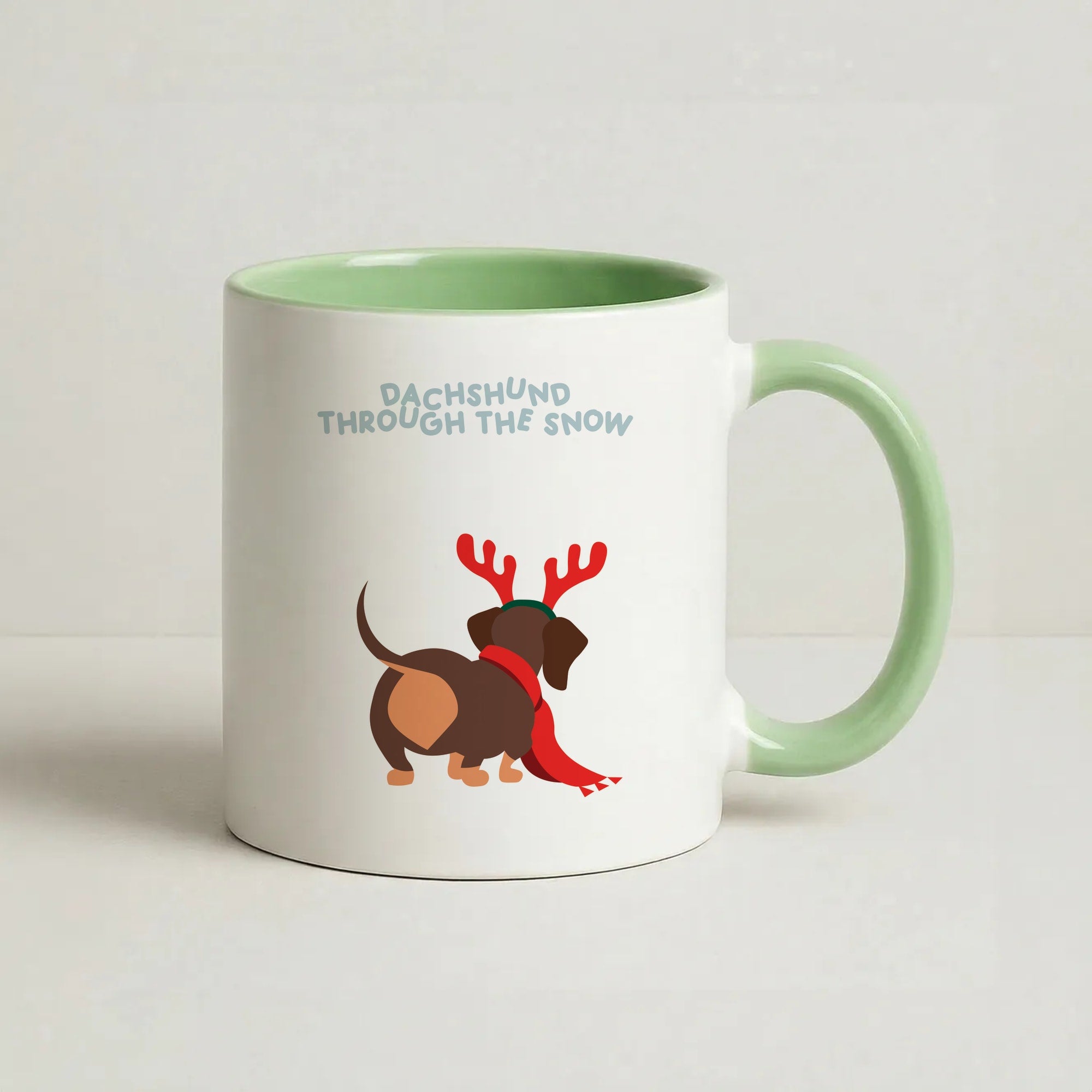 Dachshund Through The Snow - Christmas Coffee Green Mug