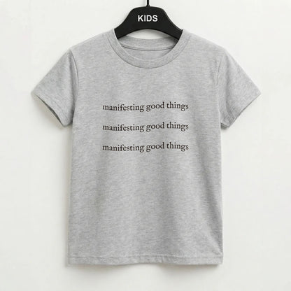 Manifesting Good Things Kids T-Shirt