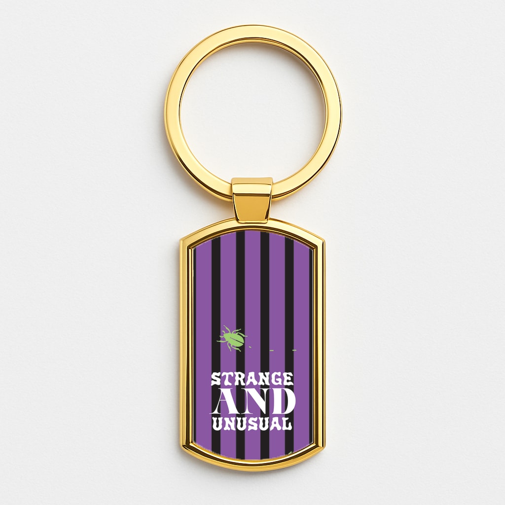 Strange And Unusual Gold Keyring