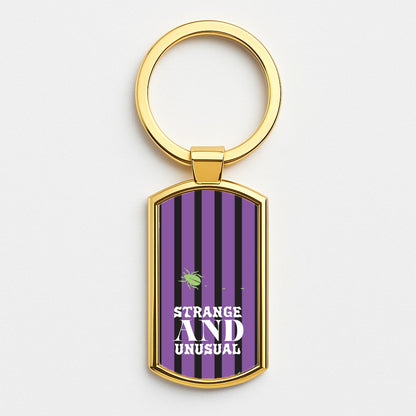 Strange And Unusual Gold Keyring