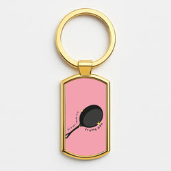 All A Girl Needs Is A Frying Pan Gold Keyring
