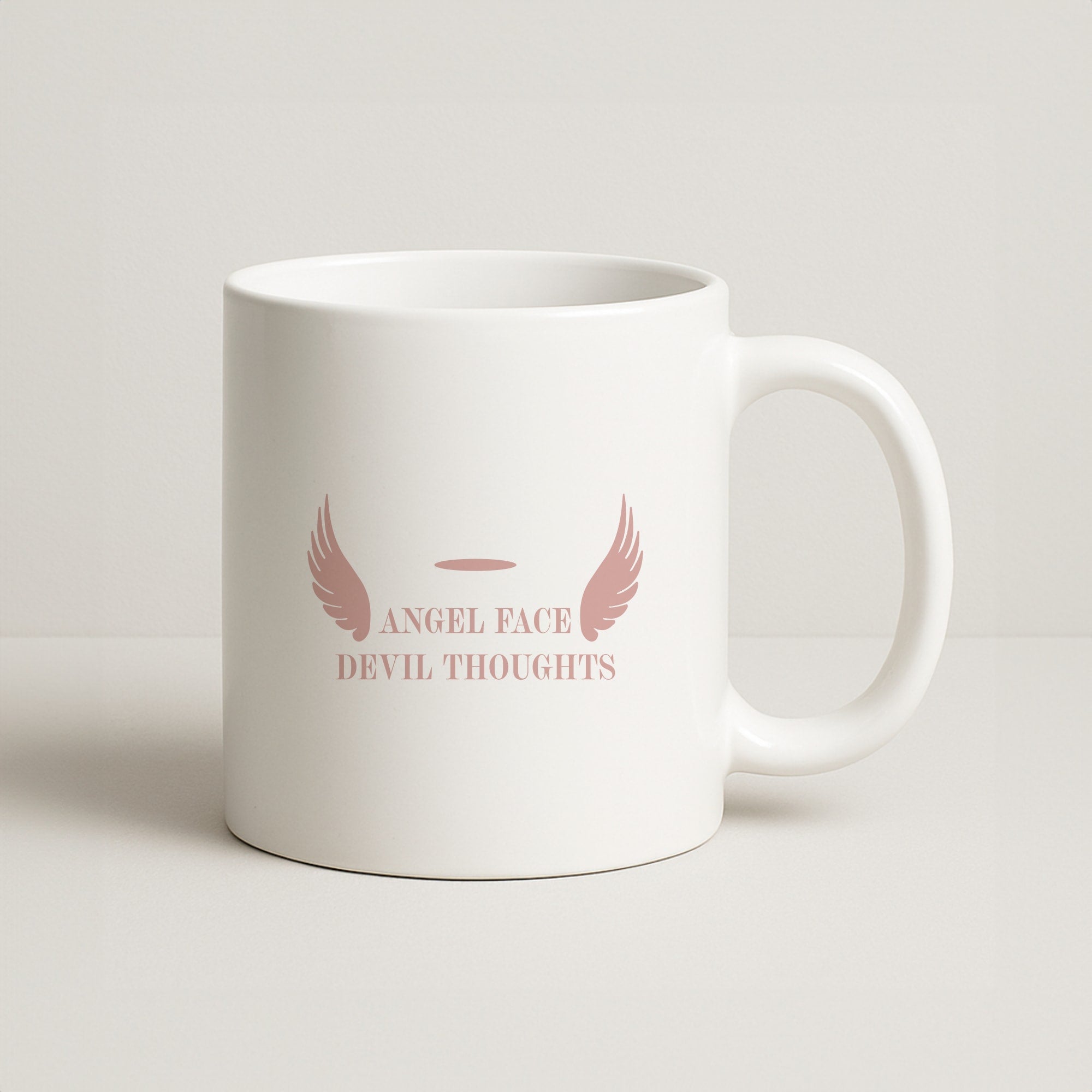 Angel Face Devil Thoughts Coffee Mug