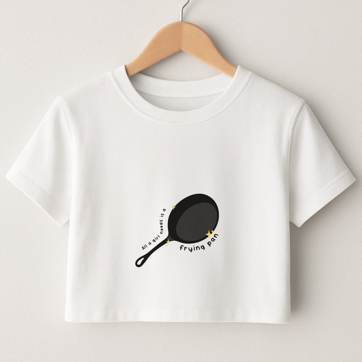 All A Girl Needs Is A Frying Pan Crop Top
