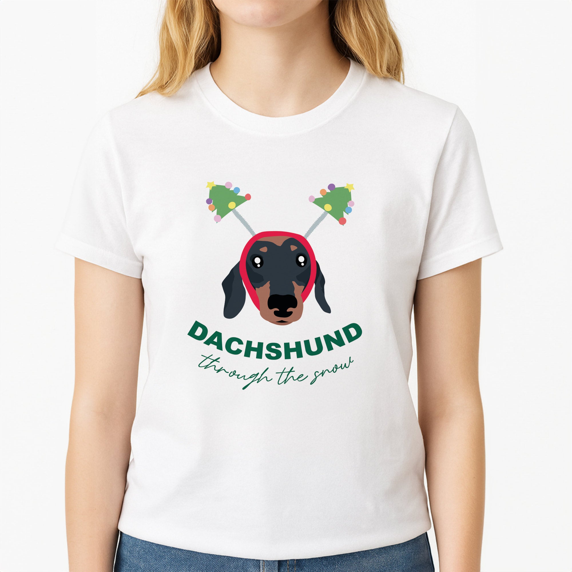 Dachshund Through The Snow Unisex T-Shirt, worn by a female model