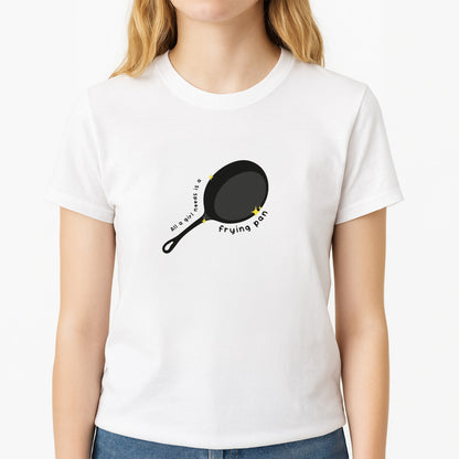 All A Girl Needs Is A Frying Pan Unisex T-Shirt, worn by a female model