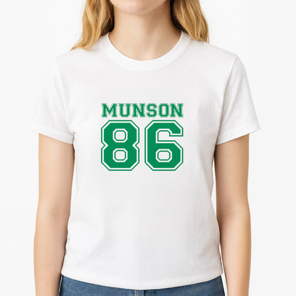 Munson 86 - Green Unisex T-Shirt, worn by a female model