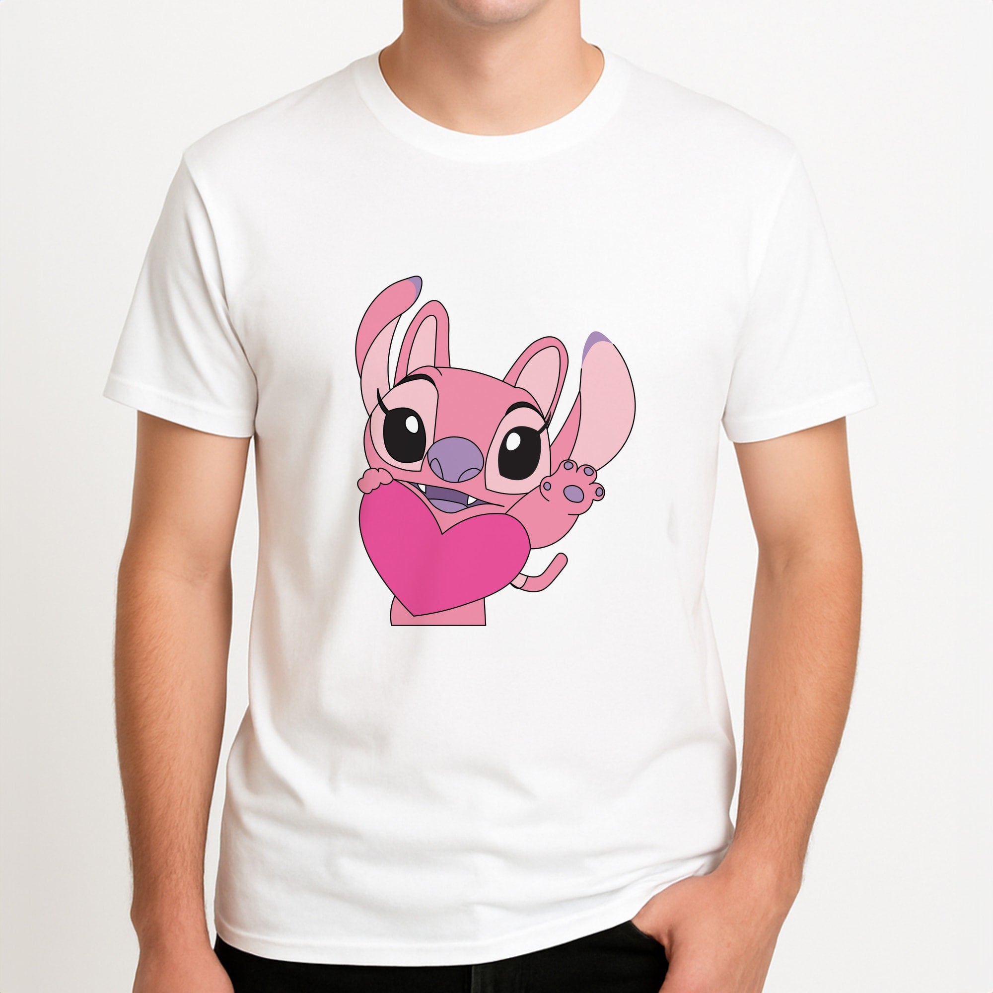 Holding Heart - Pink Alien Unisex T-Shirt, worn by a male model.