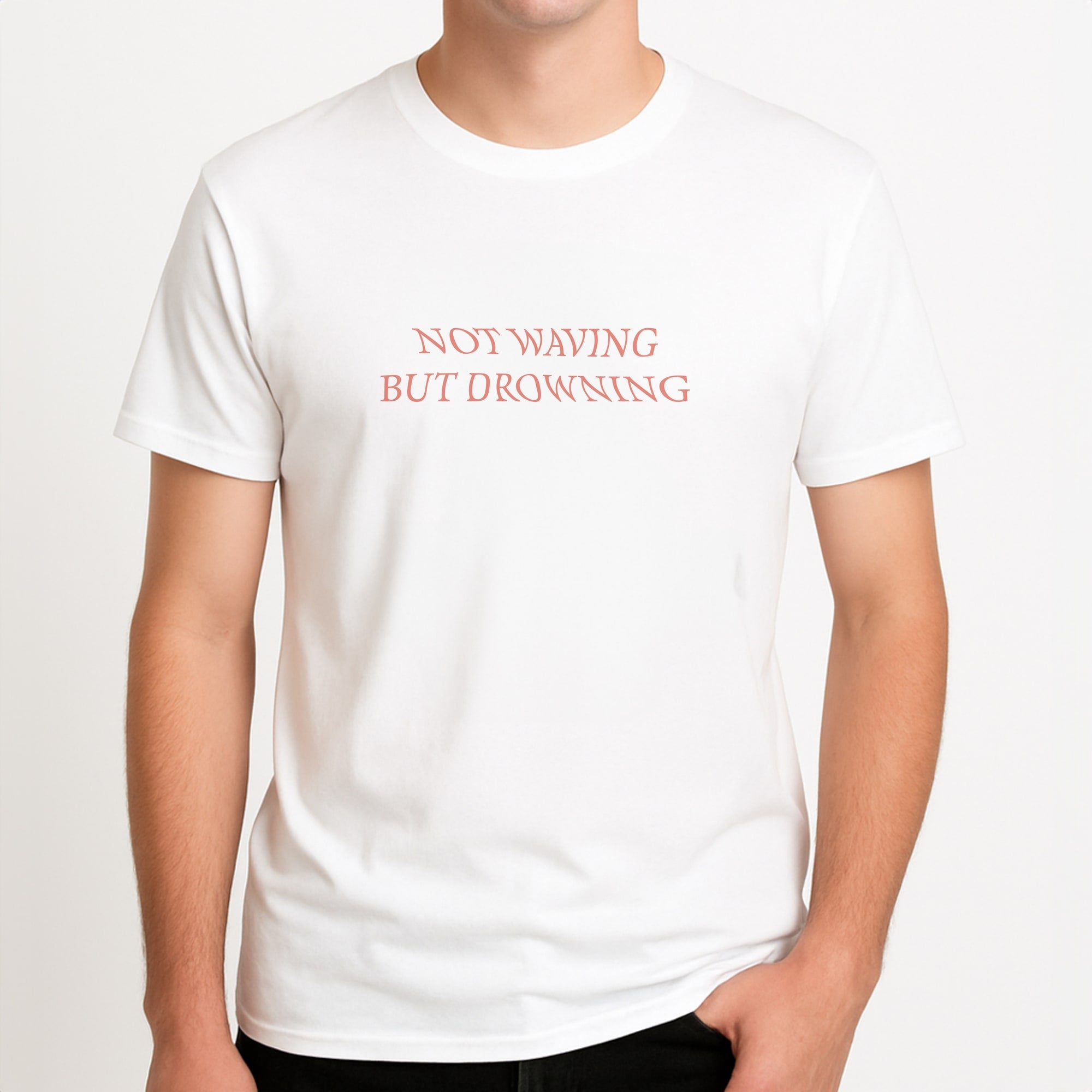 Not Waving But Drowning - Unisex T-Shirt, worn by a male model.