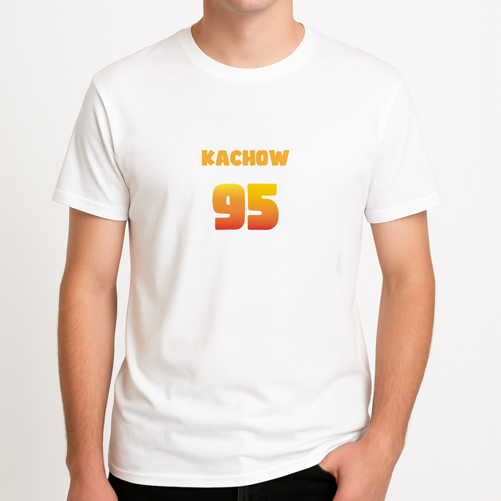 Kachow 95 - Cars Unisex T-Shirt, worn by a male model.