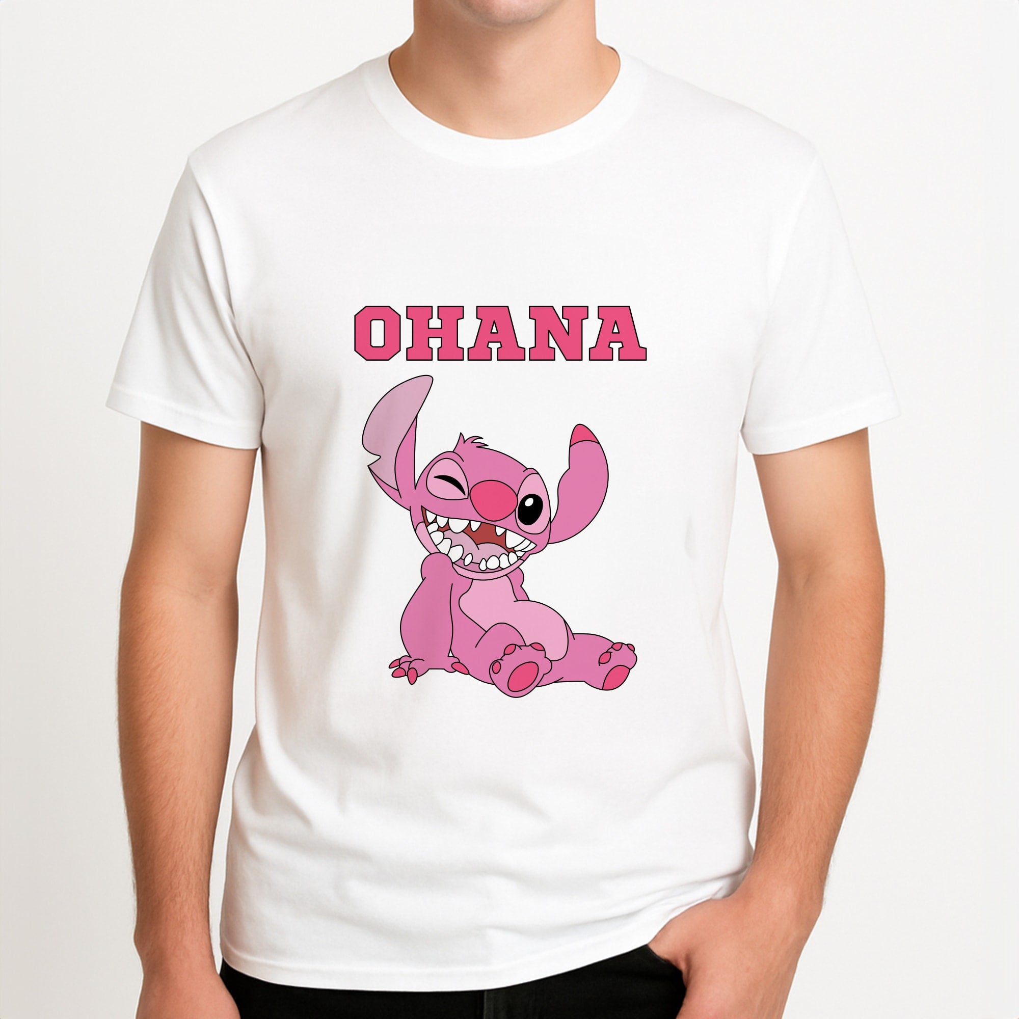 Pink Alien Ohana Unisex T-Shirt, worn by a male model.