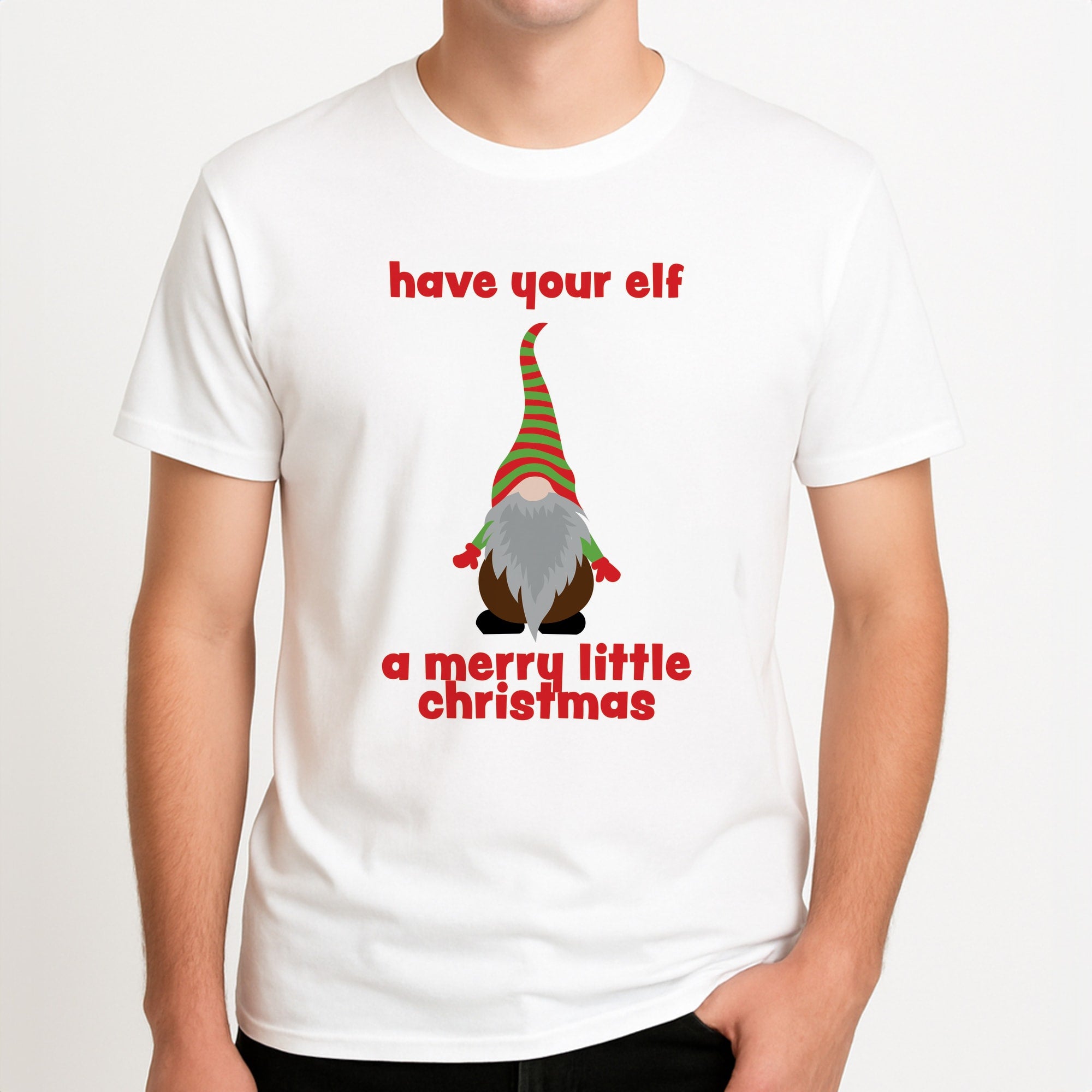 Have Your Elf A Merry Little Christmas Unisex T-Shirt, worn by a male model.