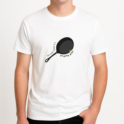 All A Girl Needs Is A Frying Pan Unisex T-Shirt, worn by a male model.